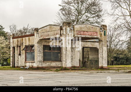 Beautiful vintage service station with character needs to be freshened up a bit. Stock Photo