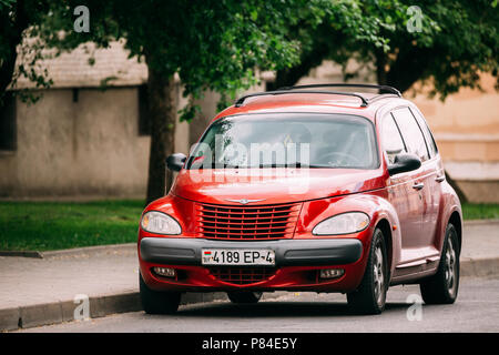 Grodno, Belarus - June 11, 2017: Red Color Car Chrysler PT Cruiser Parked On Street of Grodno. Stock Photo