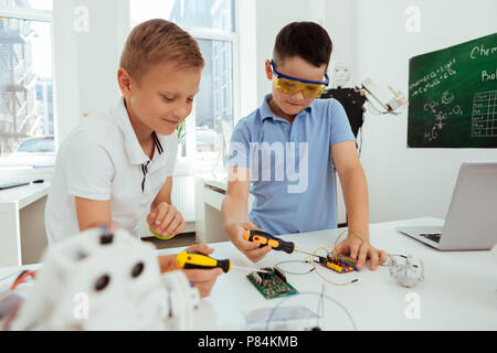 Nice smart boys being in the class Stock Photo