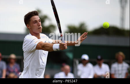 Joe Salisbury during the doubles on day seven of the Wimbledon Championships at the All England Lawn Tennis and Croquet Club, Wimbledon. Stock Photo