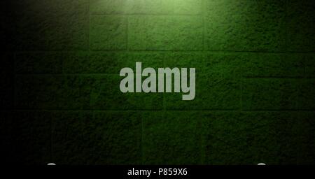 Vignette and light on green brick wall background Stock Photo