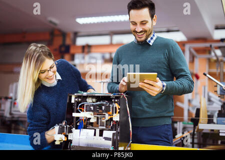 Young students of robotics working on project Stock Photo