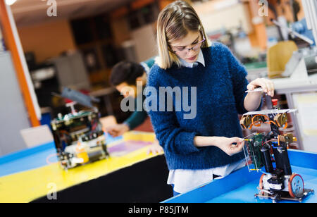 Young student of robotics working on project Stock Photo