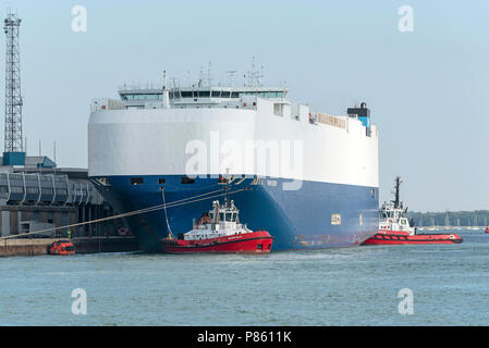 Tug alongside the Viking Destiny a car carrier ship. Port of ...