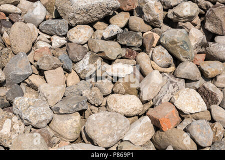 Heap of old building stones and bricks Stock Photo