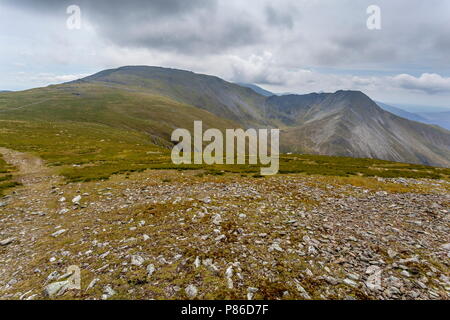 The summits of Carnedd Llewelyn and Yr Elen viewed from near the summit of Foel Grach Stock Photo