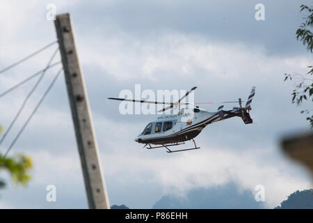 Mae Sai, Chiang Rai, Thailand. 9th July, 2018. A Royal Thai Police helicopter flies away to evacuate the 5th person from the Tham Luang cave to a hospital in Chiang Mai Credit: Adryel Talamantes/ZUMA Wire/Alamy Live News Stock Photo