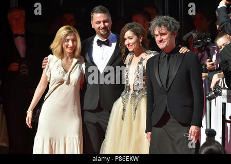 Karlovy Vary, Czech Republic. 07th July, 2018. The Grand Jury members Italian producer Marta Donzelli, from left, dean of Prague's Film Academy (FAMU), publicist and producer Zdenek Holy, Croatian actress Zrinka Cvitesic and Northern Ireland-born, Scotland-based film theorist and director Mark Cousins arrive to closing ceremony of the 53rd Karlovy Vary International Film Festival (KVIFF) in the Czech Republic on July 7, 2018. Credit: Katerina Sulova/CTK Photo/17�Թ����� Live News Stock Photo