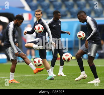Saint Petersburg, Russia. 9th July, 2018. France's Antoine Griezmann (2nd L) attends a training session in Saint Petersburg, Russia, on July 9, 2018. Credit: Lu Jinbo/Xinhua/Alamy Live News Stock Photo