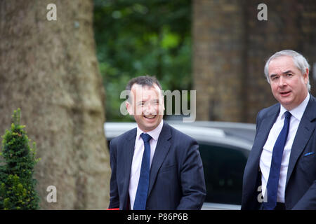 London,UK,10th July 2018,Secretary of State for Wales The Rt Hon Alun Cairns MP and Attorney General Geoffrey Cox QC MP arrive for weekly cabinet meeting after yesterday’s shock resignations of David Davis and Boris Johnson at 10 Downing Street in London.Credit Keith Larby/Alamy Live News Stock Photo