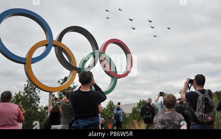 Stratford, London, UK. 10th July, 2018. Puma HC2 and Chinook helicoptors at the head of the flypast. Royal Air Force (RAF) 100 years celebration flypast. Queen Elizabeth Olympic Park. Stratford. London. UK. 10/07/2018. Credit: Sport In Pictures/Alamy Live News Stock Photo