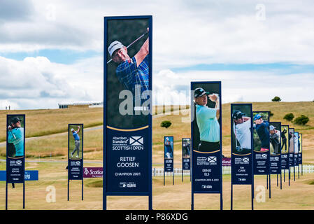 Aberdeen Standard Investments Scottish Open Golf Championship final preparations, Gullane, East Lothian, Scotland, United Kingdom, 10th July 2018. The final stages of preparations in progress for the 5th European Tour Rolex Series at Gullane Golf Course in preparation for the start of the championship from 12th to 15th July. Banners with past winners of the championship Stock Photo