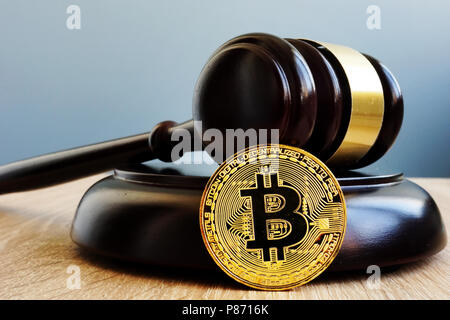 Crypto regulation. Gavel and cryptocurrency BTC Bitcoin. Stock Photo