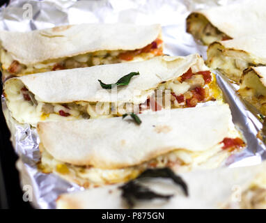 Hot mexican food quesadilla on a tray of an oven Stock Photo