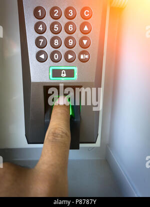 The system scans the fingerprint security systems, fingerprint scanning is widely used in the office. - Focus at fingerprint scan point Stock Photo