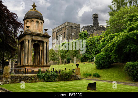 Monument and tomb of Rev Ebenezer Erskine and other gravestones at Stirling Youth Hostel with Old Town Jail in Stirling Scotland UK Stock Photo