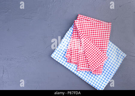 on the table, in a red and blue cage. Clean table. Copy space. Stock Photo