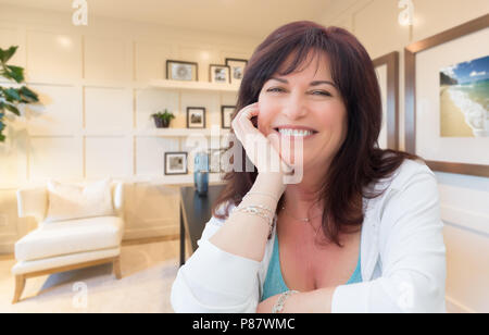 Attractive Middle Aged Woman Portrait Inside Her Home Office Stock Photo