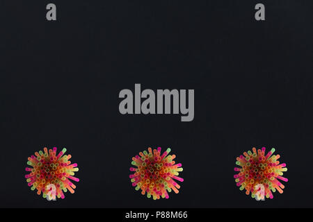 Creative view of drinking straws for party on black background in neon colors. Top view. Template. Stock Photo