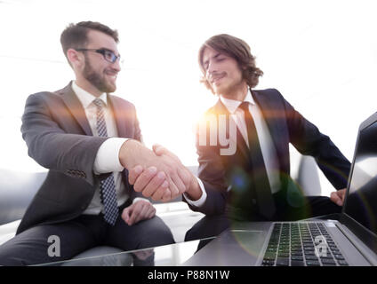 closeup.colleagues shaking hands Stock Photo