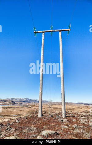 Pylons on the south coast of Iceland and beautiful blue sky. Stock Photo