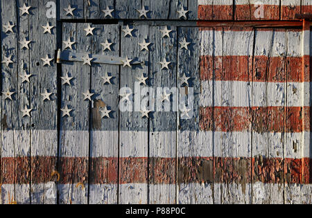 Detail of American flag painted on side of old southern Maryland tobacco barn dedicated to US Troops Stock Photo