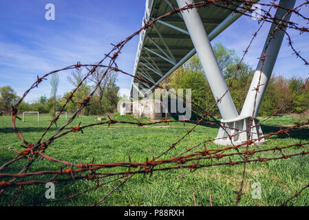 Remains of so called Iron Curtain under Freedom Cycling Bridge spanning River Morava between Slovakia and Austria in Devinska Nova Ves, Bratislava Stock Photo