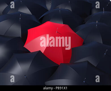 Red umbrella outstanding from black umbrellas. Stock Photo