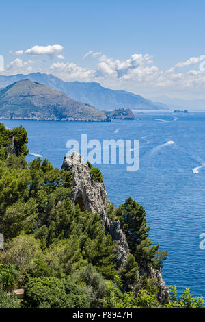 The Natural Arch and coastline on the eastern side of Capri, Italy Stock Photo
