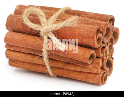 Bunch of some fresh aromatic cinnamon over white background Stock Photo