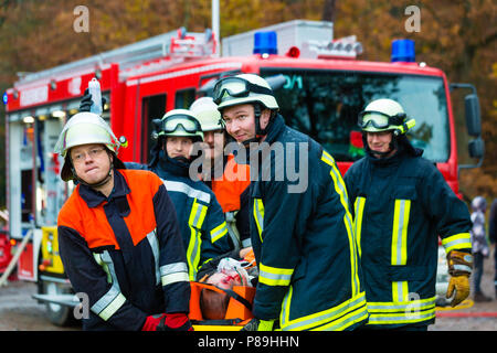 Accident - Fire brigade, Accident Victim on Stretcher Stock Photo