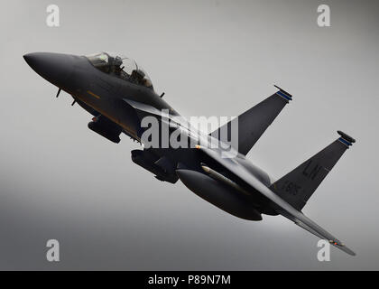 U.S. Air Force Col. Evan Pettus, 48th Fighter Wing commander, makes a high-speed pass over Royal Air Force Lakenheath, England July 9, 2018. The flight served as Pettus’ last as the commander of the Liberty Wing. (U.S. Air Force photo/Tech. Sgt. Matthew Plew) Stock Photo