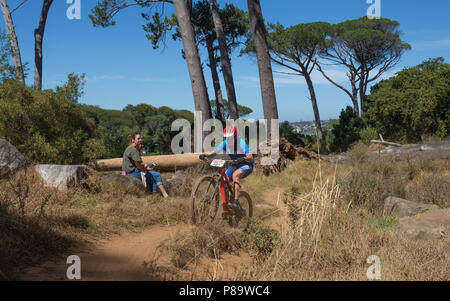 Cape Epic 2018 cyclist on tough endurance race in Cape Town, South Africa with spectators Stock Photo