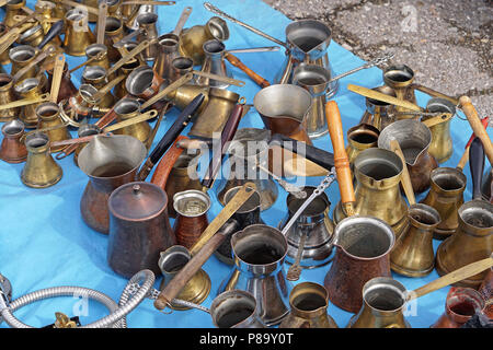 Very old style used copper coffee pots Stock Photo