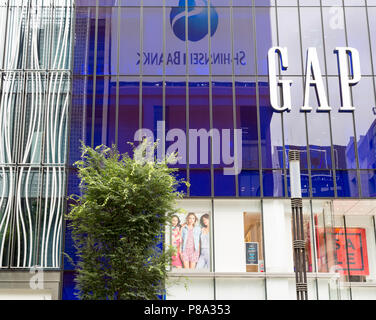 Tokyo, Japan - 24th June 2016: The modern style and architecture of the Gap store exterior in the exclusive and fashionable district of Ginza, Tokyo. Stock Photo