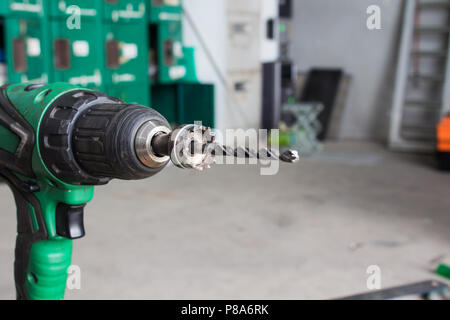 The industrial engineer using a mechanical drill machine Stock Photo