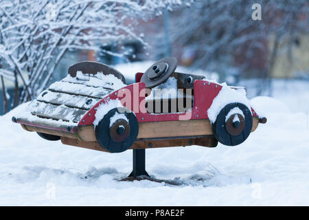 Small playground car at winter Stock Photo