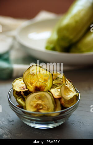 Healthy snack - baked zucchini chips. Vegan food, hamemade Stock Photo