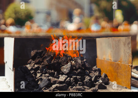 the workpiece lies in the fire in the blacksmith's workshop Stock Photo
