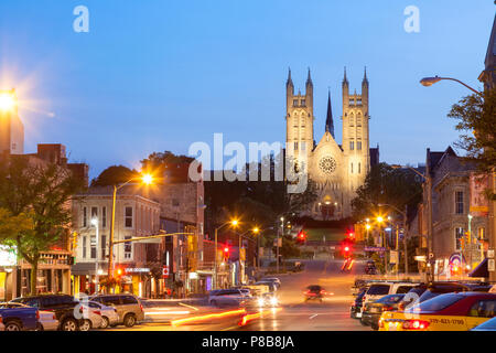 Historical buildings with Basilica of Our Lady Immaculate along Macdonell Street at dusk in downtown Guelph, Ontario, Canada. Stock Photo