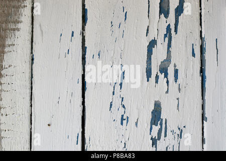 Weathered wood texture with chipped paint. Abstract white and blue background. Stock Photo