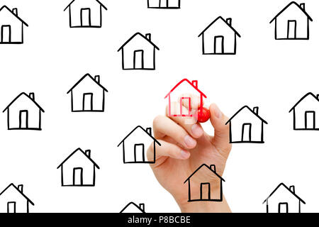 Hand drawing finding new house to buy concept with marker on transparent wipe board.