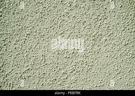 Painted rough cast wall render texture full frame background Stock Photo