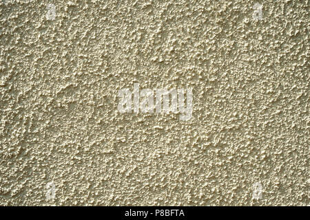 Painted rough cast wall render texture full frame background Stock Photo