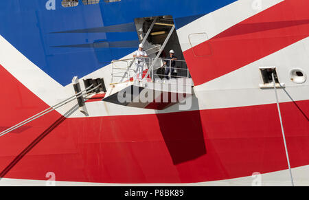 Ship's officer standing on the mooring plaform to oversee the safety of the berthing of this cruise liner, Port of Southampton, England UK Stock Photo