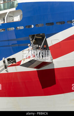 Ship's officer standing on the mooring plaform to oversee the safety of the berthing of this cruise liner, Port of Southampton, England UK Stock Photo