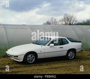 Porsche 924S 1985 Model year - shown in white paint shown on a farm Stock Photo