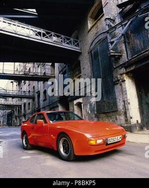 Porsche 944 - 1985 model year shown in guards red paint in an urban setting Stock Photo