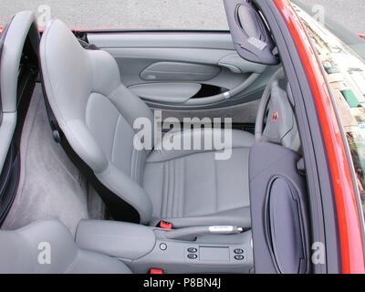 Porsche Boxster S in Red - 2002 model - showing top down view of sports seats drivers side Stock Photo