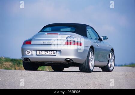 Porsche 911 Carrera Cabriolet - 2002 model year in silver metallic showing rear view Stock Photo